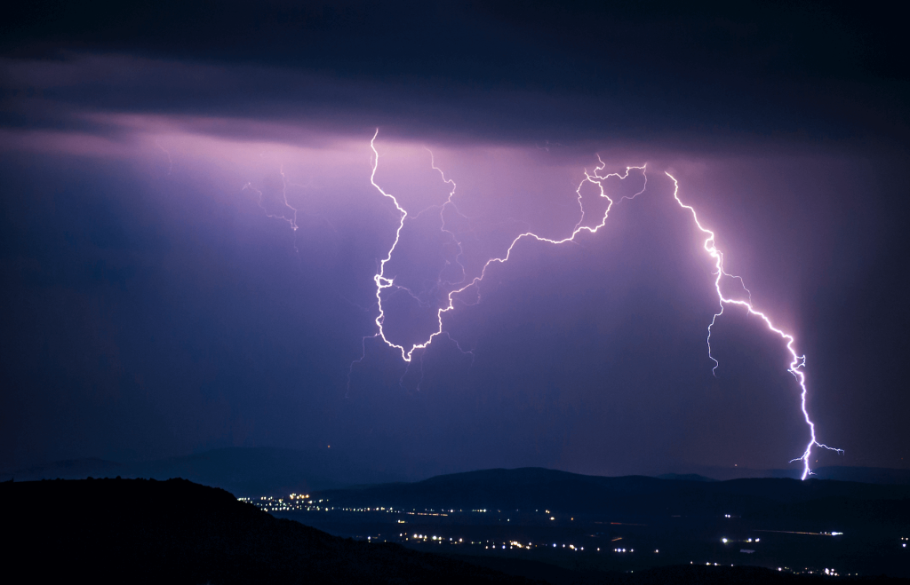 flash of lightning during rain storm